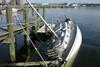 Sandy: Pleasure boat damage due to dock collision in New London, CT