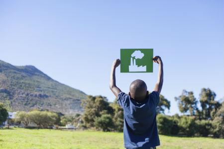 Africa boy holding factory cut out